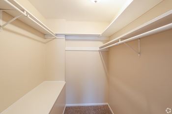 A walk-in closet at Briar Hill Apartments.